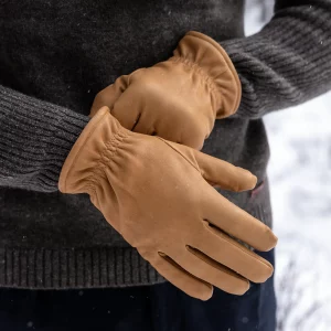Men wearing durable yak leather gloves with yak wool sweater