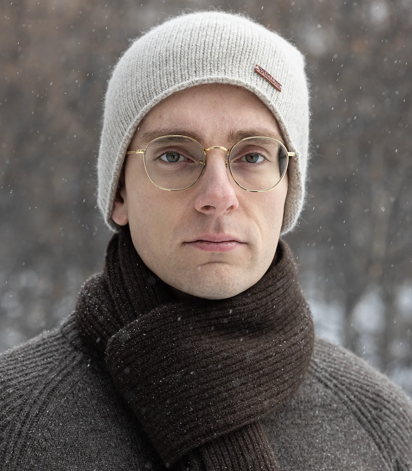 Front view of men’s soft white yak wool halo beanie